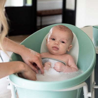 Newborn Baby Bath with Support, Rinse Jug, and Ellie Bath Toy Scoop - Taupe